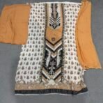 Mustard and cream shimmer maslin suit fabric with black embroidery and ethnic prints by Punjabi Threads Melbourne