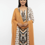 Mustard and cream shimmer maslin suit fabric with black embroidery and ethnic prints by Punjabi Threads Melbourne