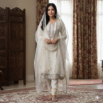 Cream self-shimmer suit with multicolor embroidery and printed dupatta from Punjabi Threads