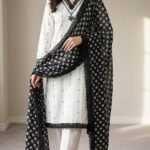 Linen cotton striped suit with black polka dot dupatta and white bottom