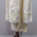 Chikankari embroidery detail on cream Anarkali kurta
